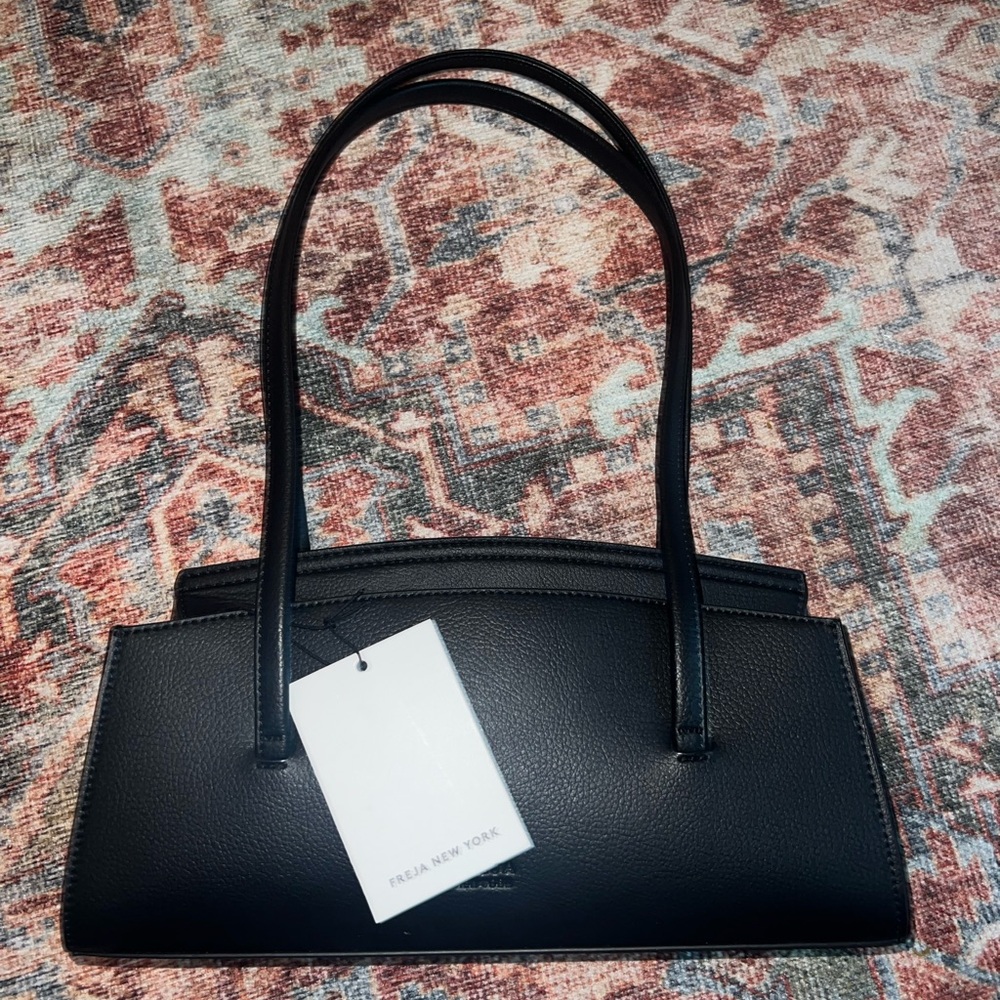 Black faux Leather Shoulder Bag by Freja New York